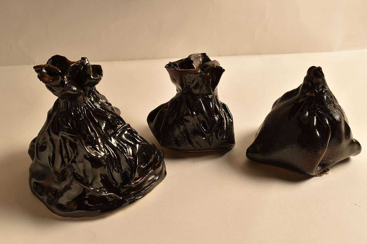Detailed image of 3 ceramic bin bags